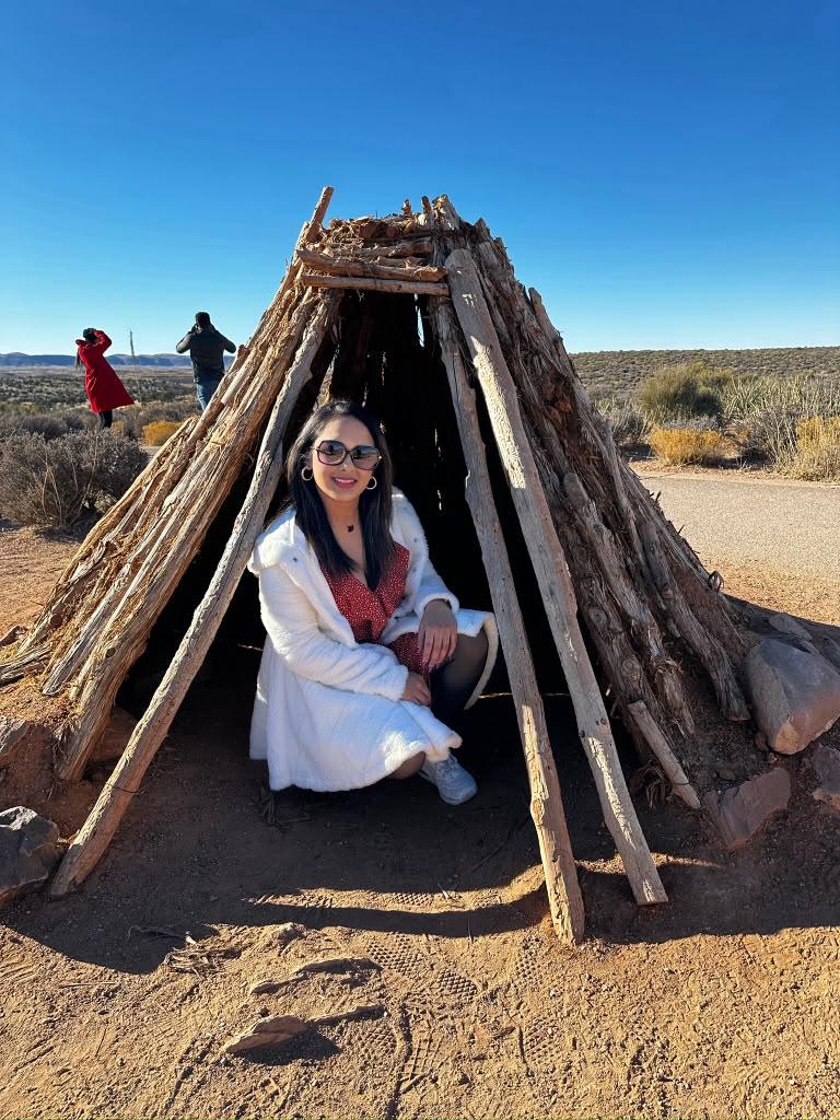 Second portrait inside a traditional wooden shelter at Grand Canyon West