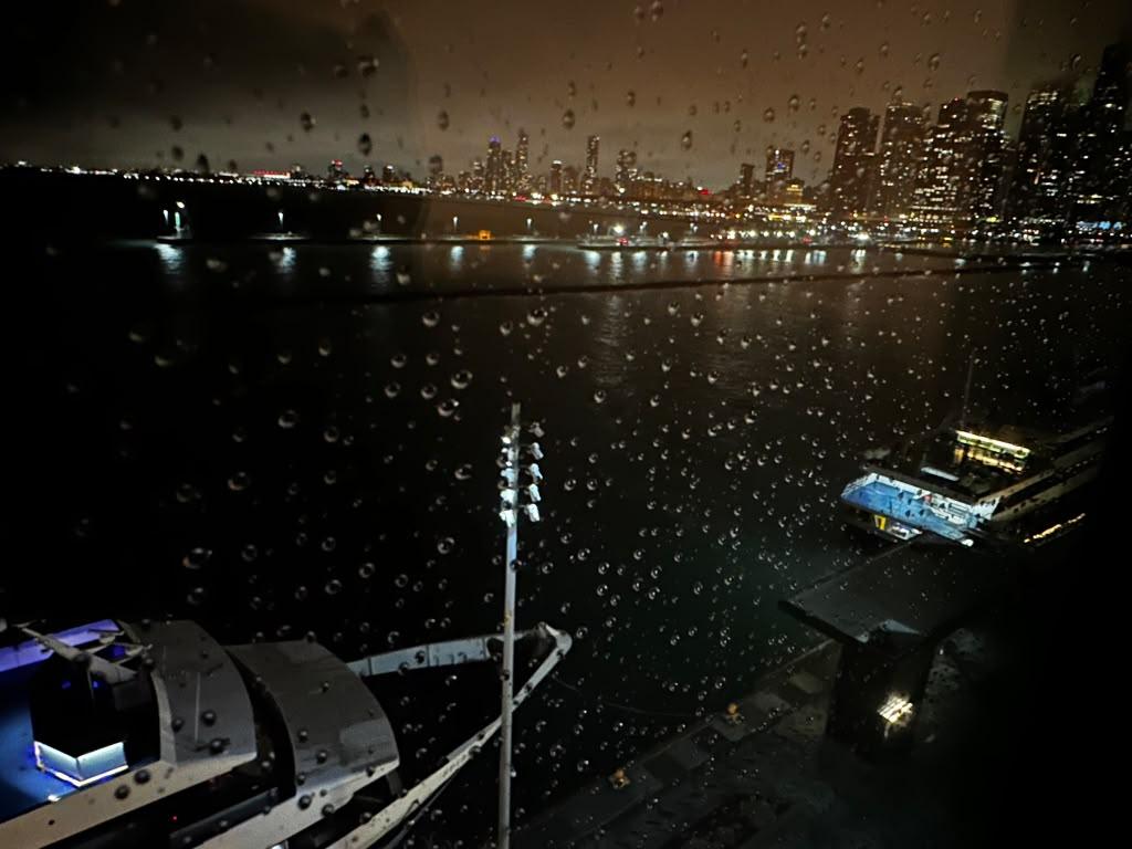 Rainy nighttime Lake Michigan and Chicago skyline view from Navy Pier