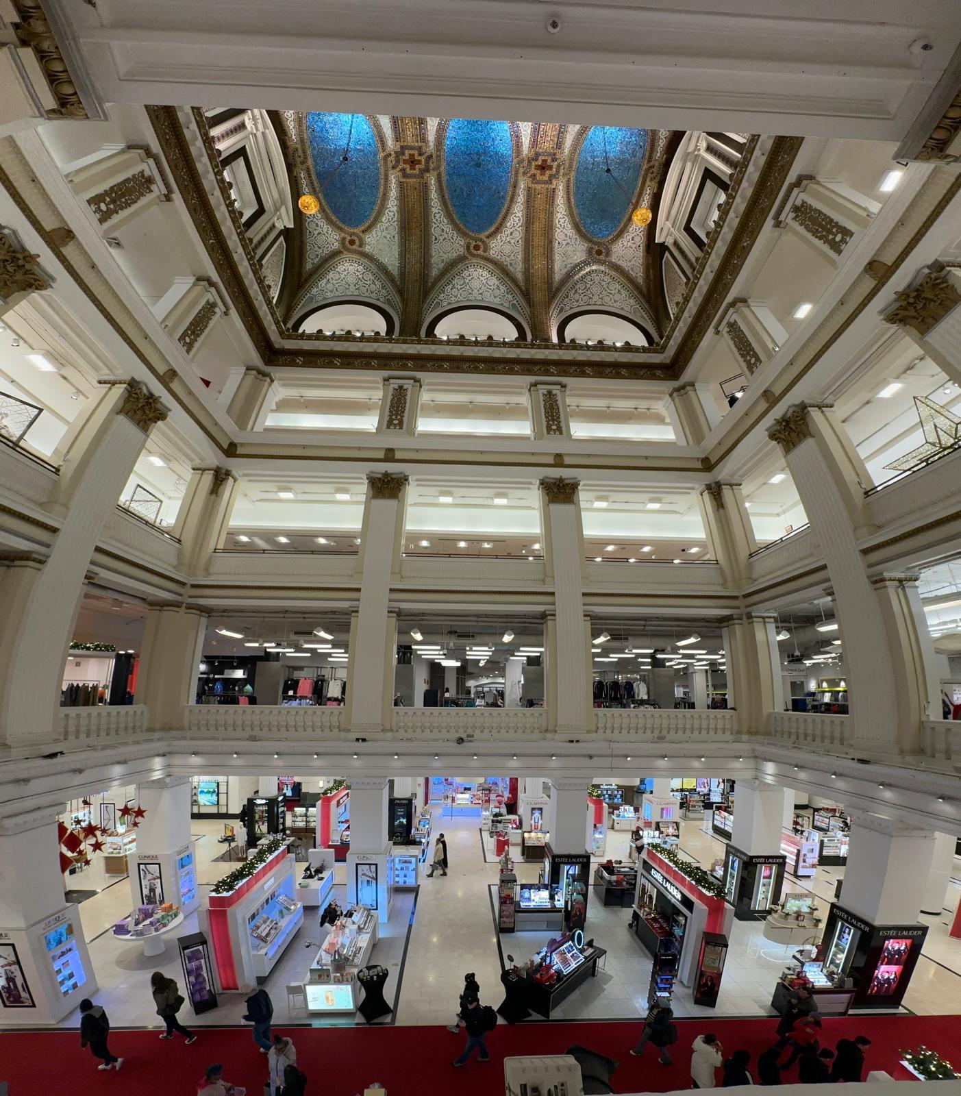Grand multi-level department-store atrium during Chicago holiday shopping