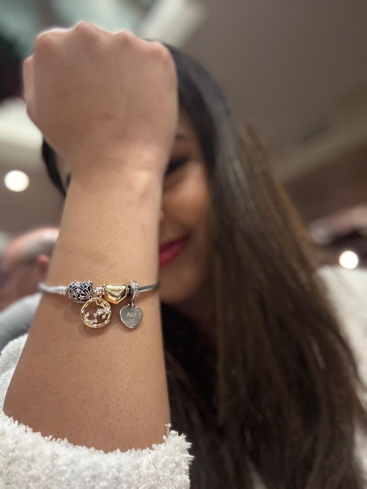 Close-up of a charm bracelet during a Chicago shopping stop