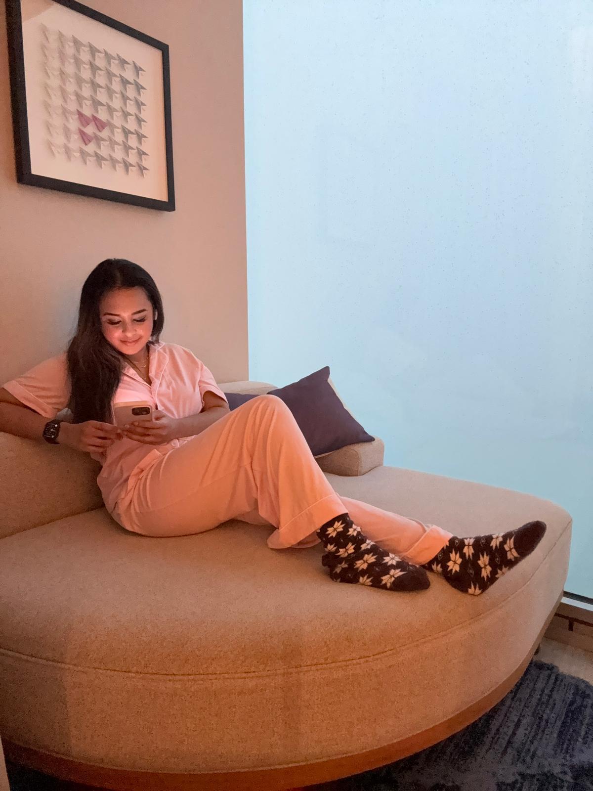 Traveller relaxing inside the Sable at Navy Pier hotel room