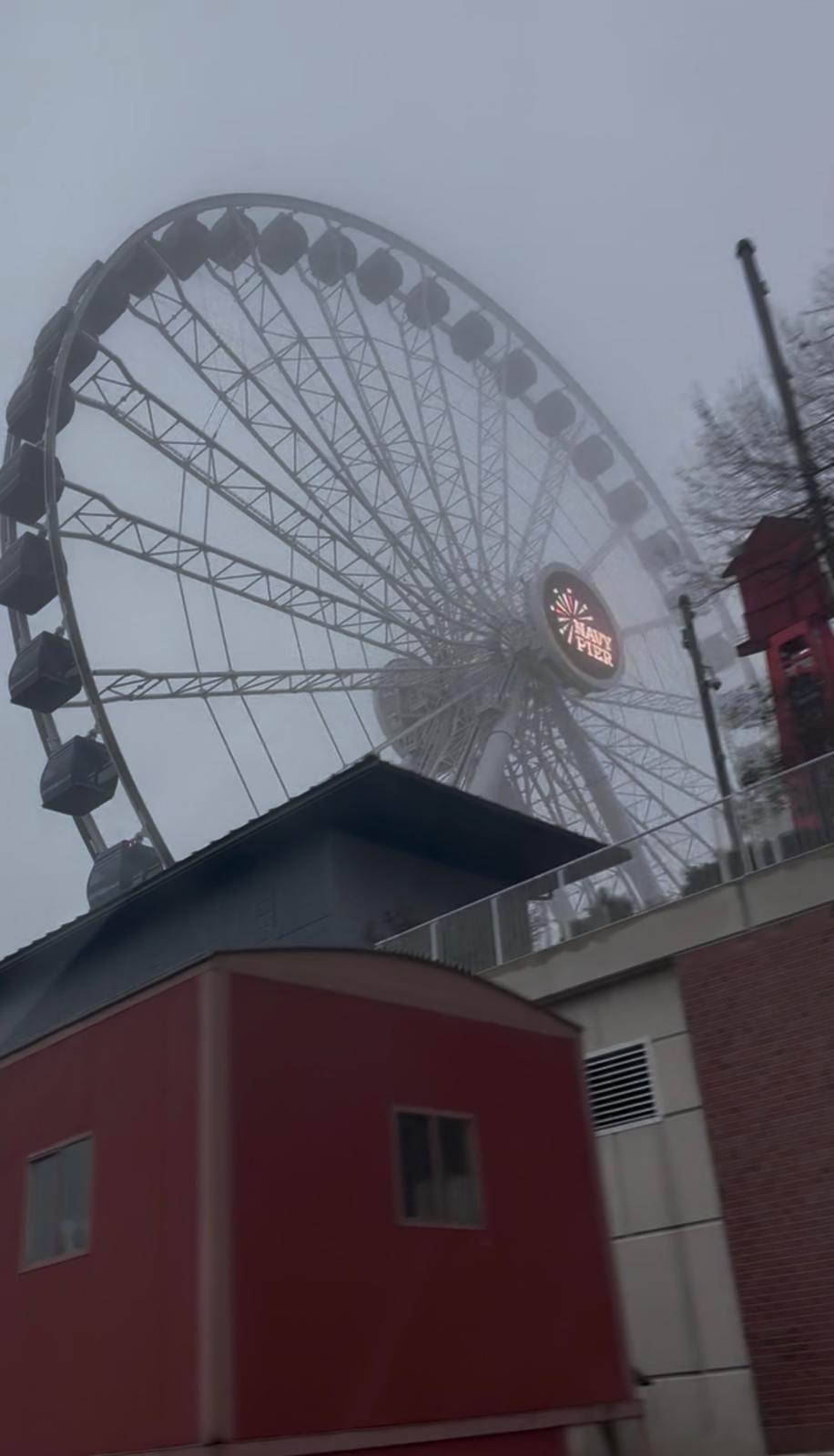 Navy Pier Centennial Wheel rising through heavy Chicago fog