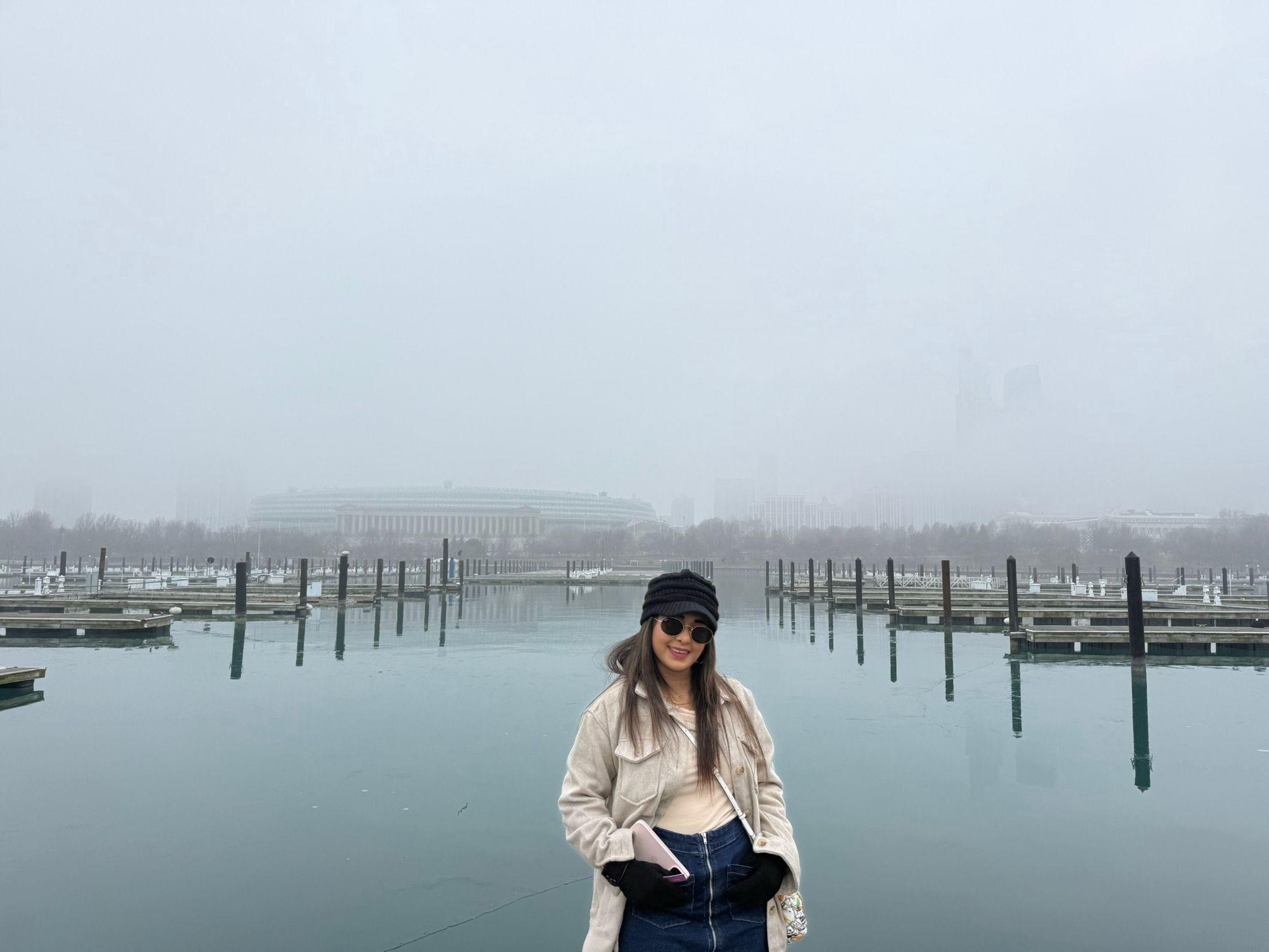 Traveller beside the foggy Lake Michigan waterfront near Navy Pier