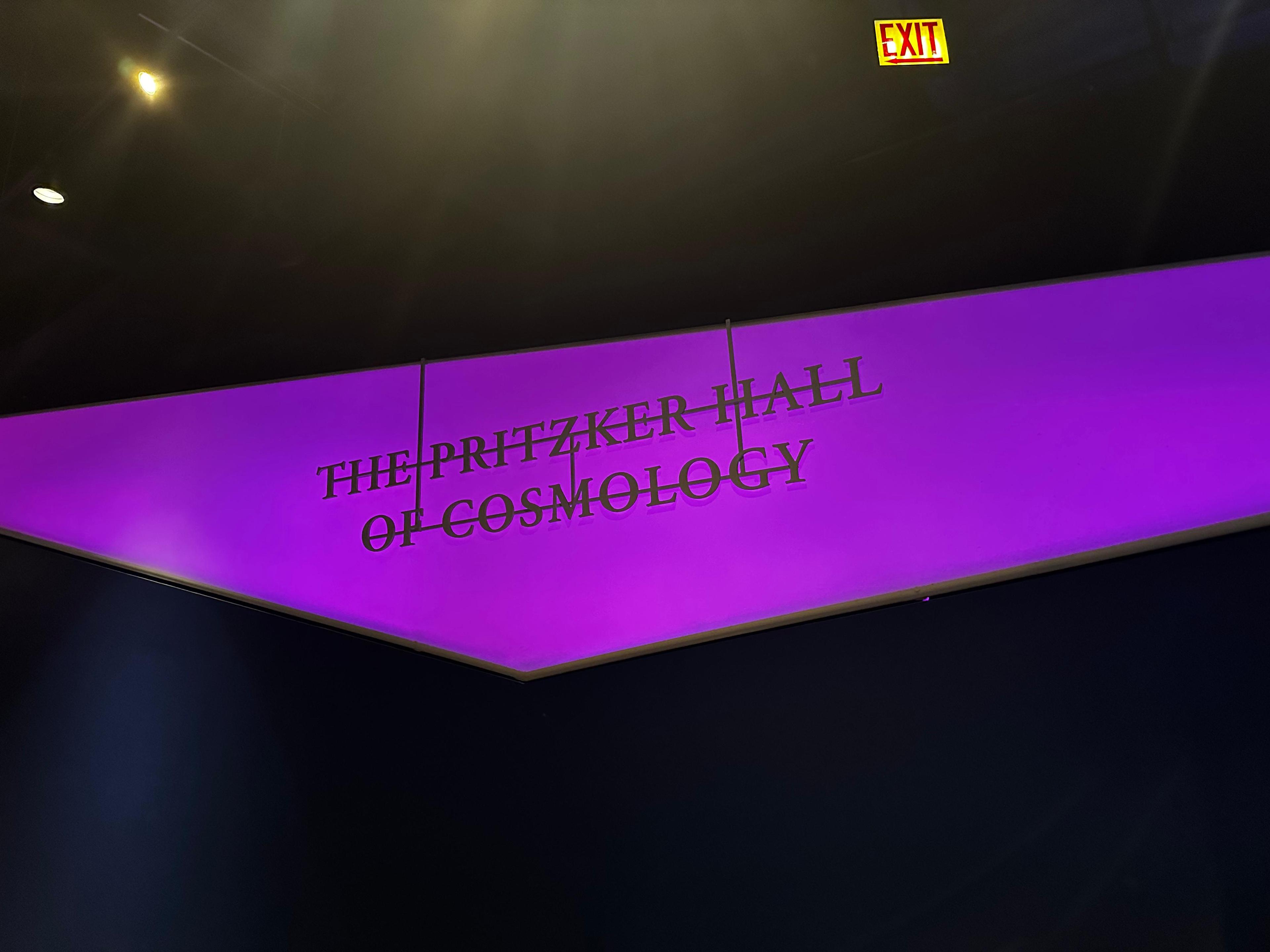 Illuminated cosmology exhibit inside Adler Planetarium