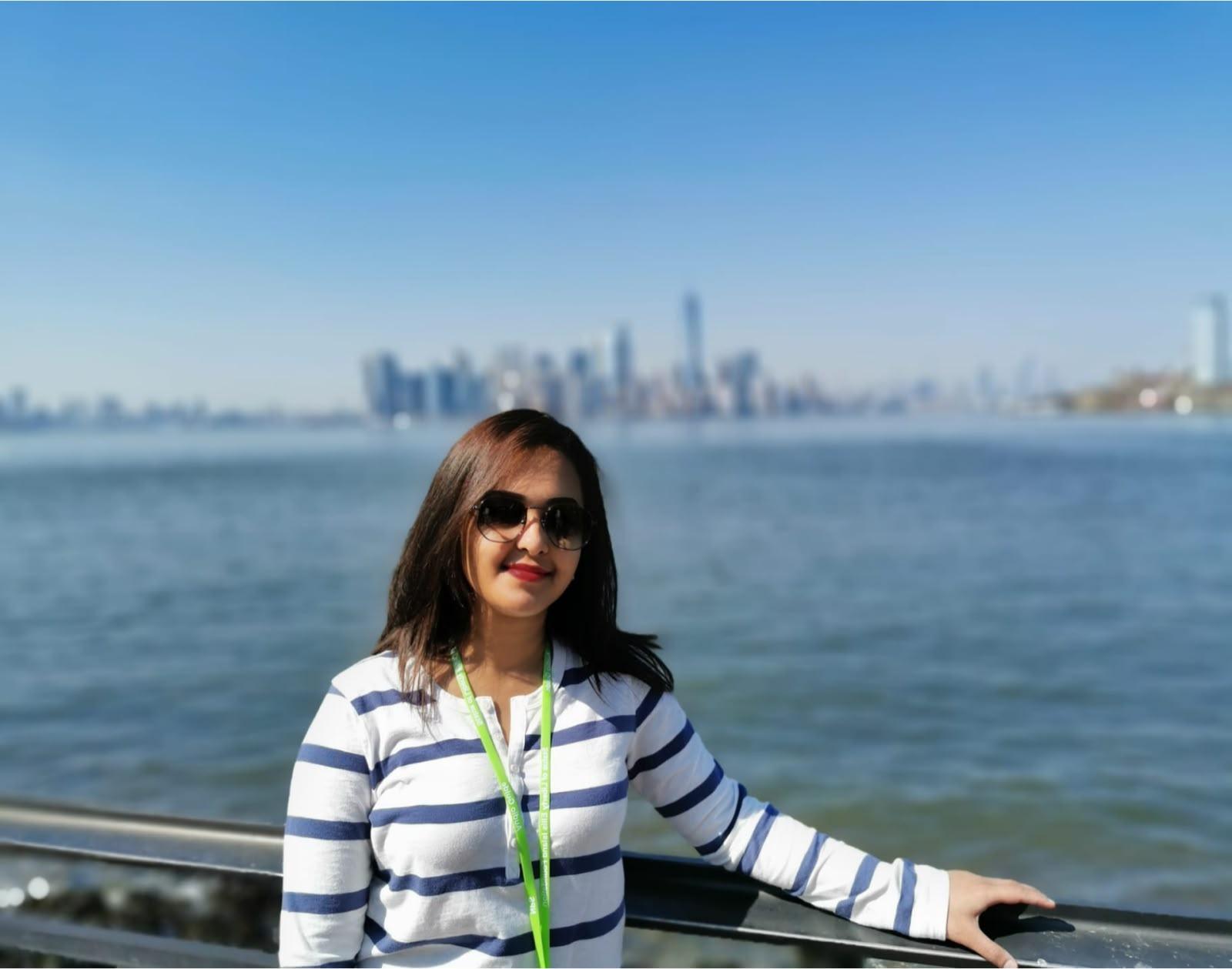 Personal ferry portrait with the Manhattan skyline across New York Harbor