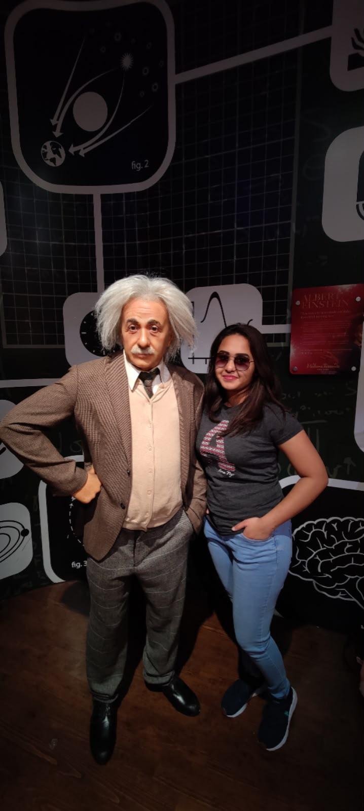 Personal portrait beside a scientist-themed wax figure