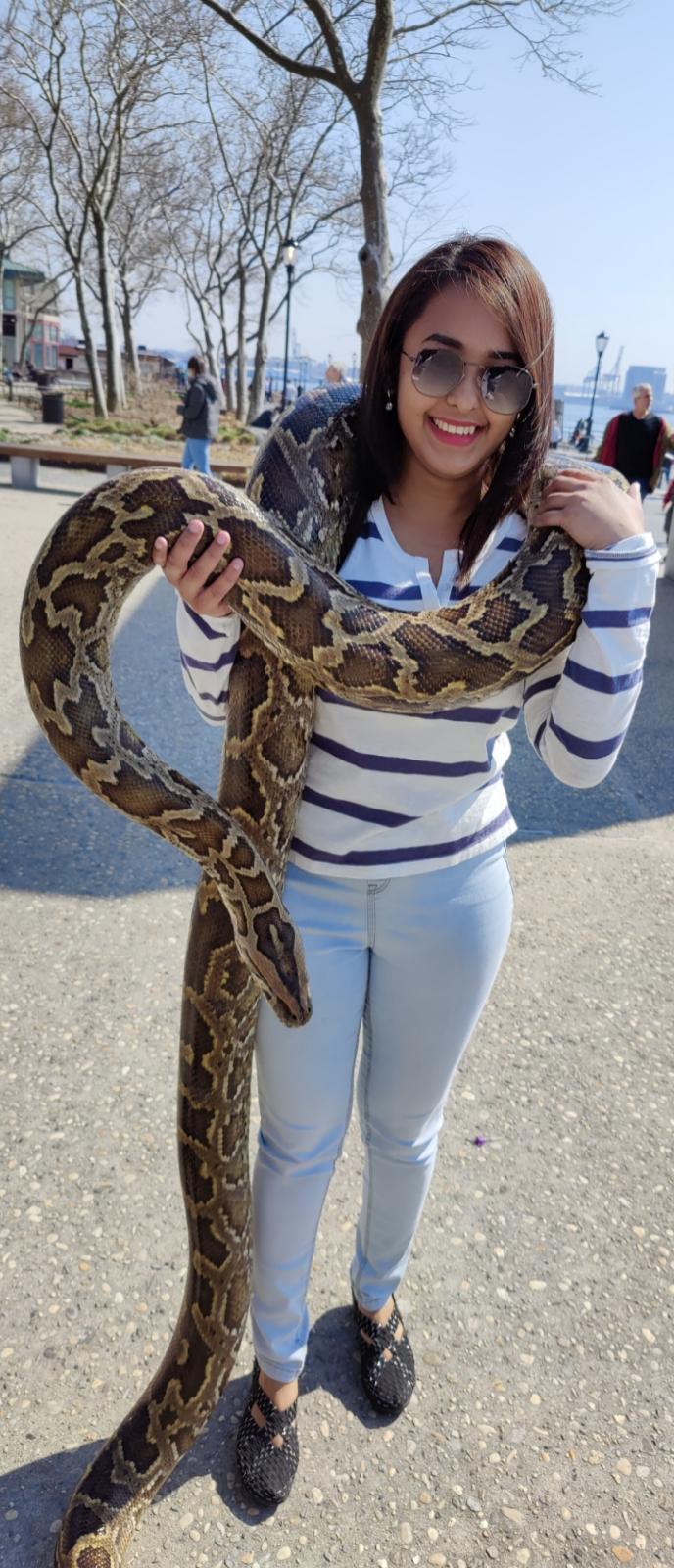 Second outdoor portrait holding a snake during the trip
