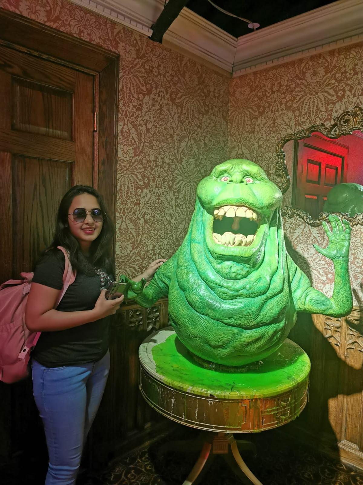 Personal portrait beside a glowing green fantasy-character display