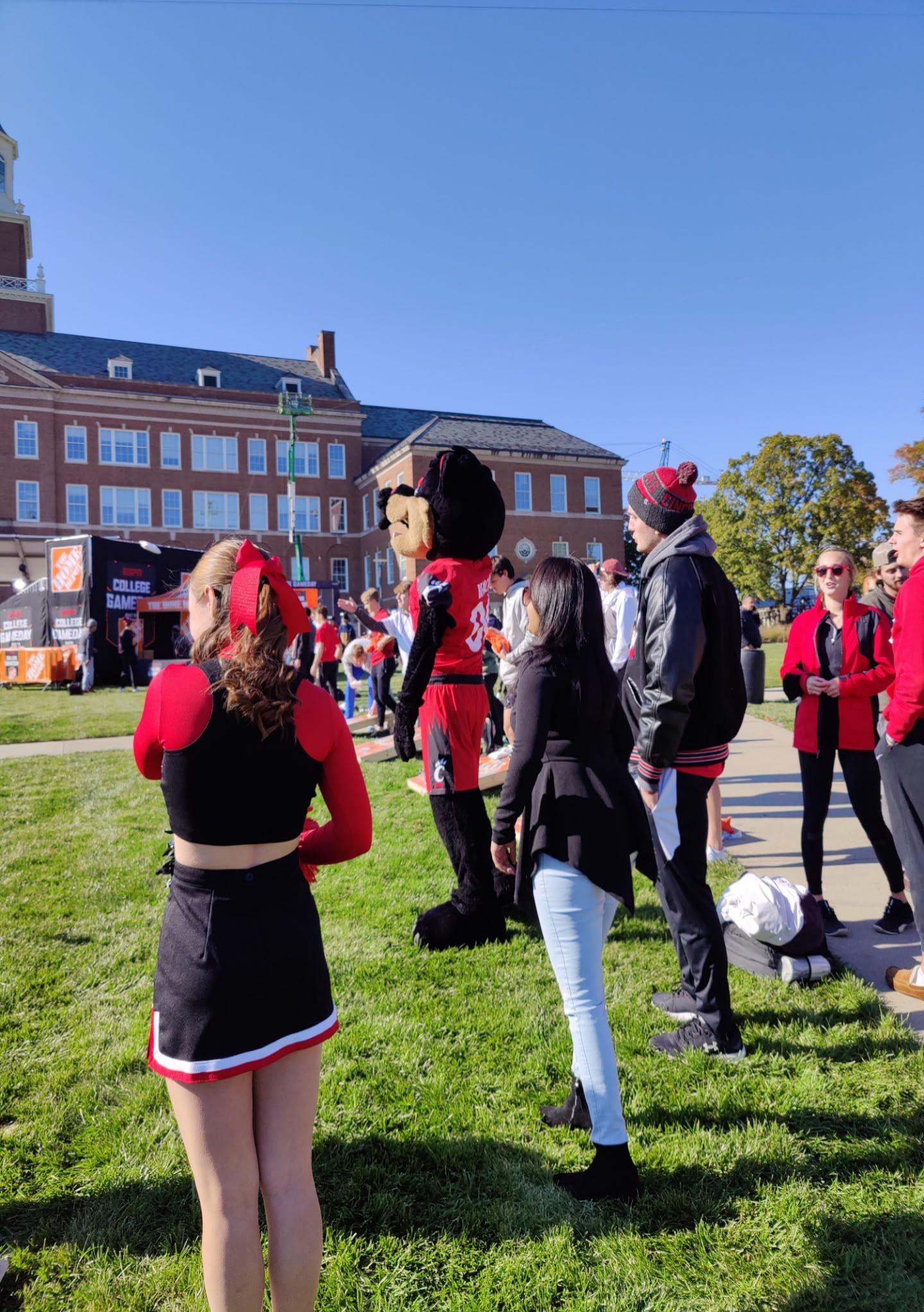 University of Cincinnati spirit-team member performing outdoors