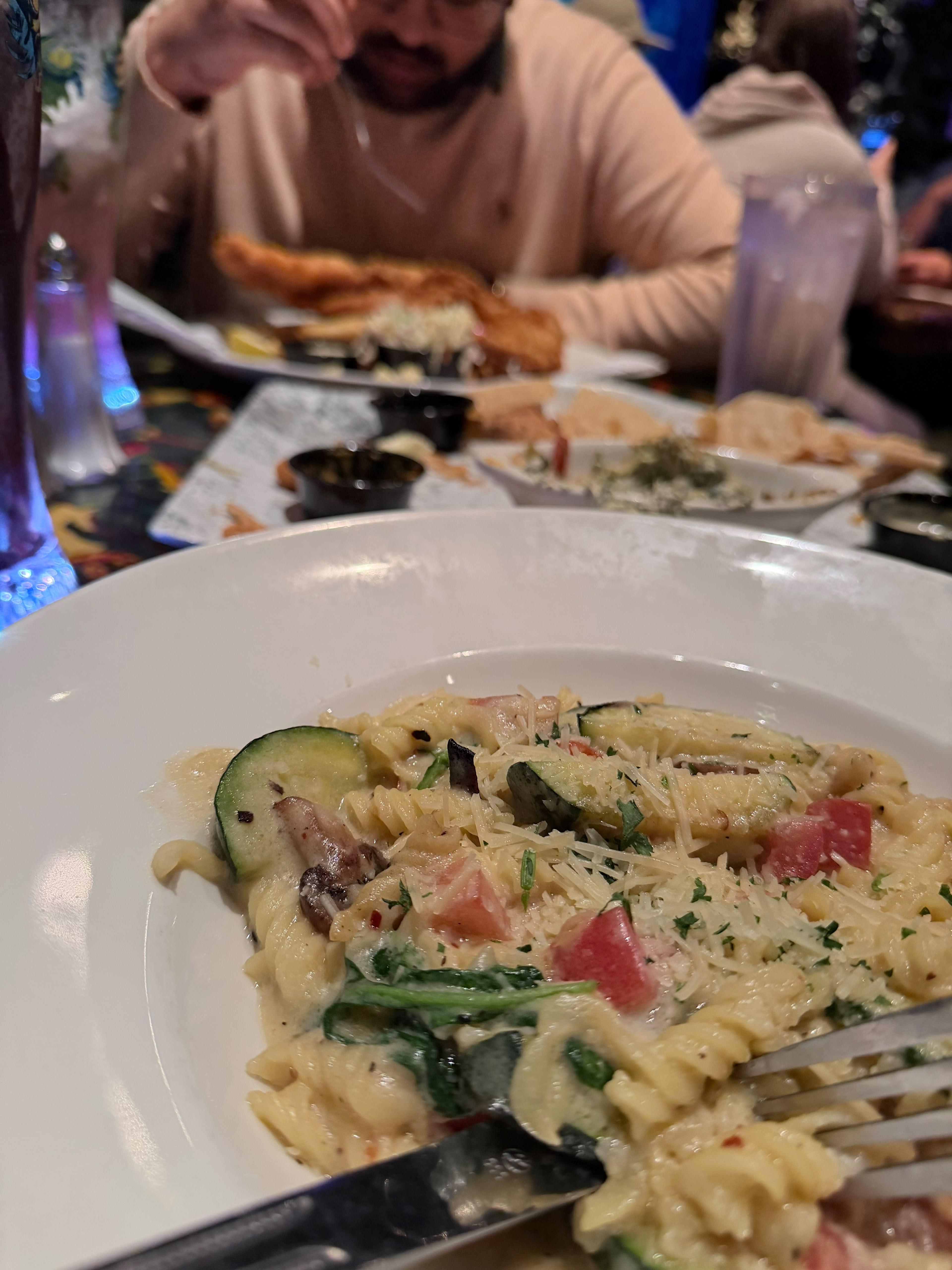 Pasta, glowing drinks, and a sweet little celebration.