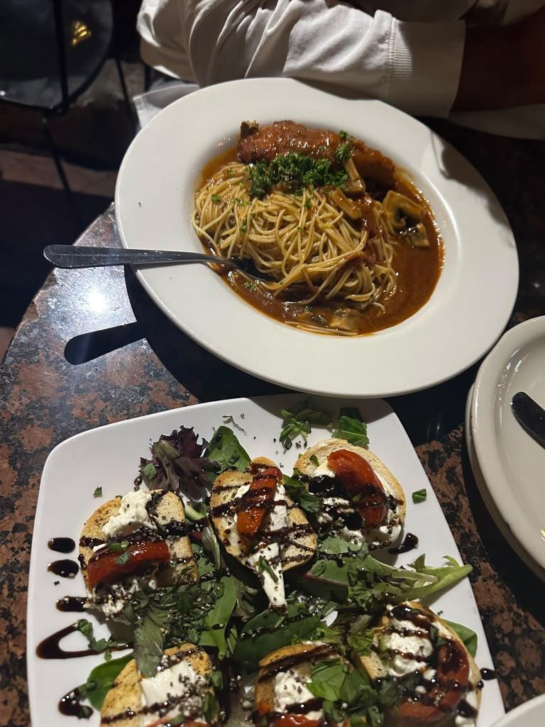 Pasta, glowing drinks, and a sweet little celebration.