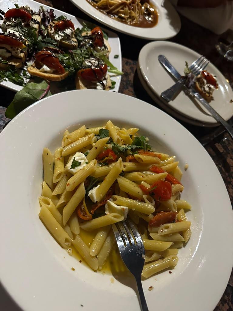 Pasta, glowing drinks, and a sweet little celebration.
