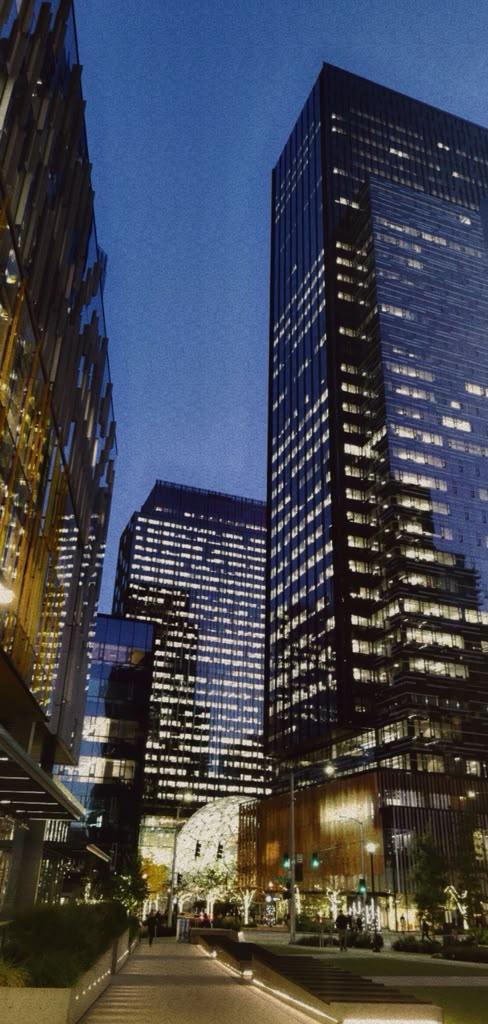 Downtown Seattle high-rises illuminated after dark